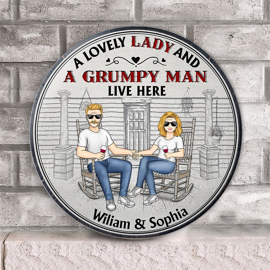 A Lovely Lady And A Grumpy Old Man Live Here - Personalized Couple Round Wood Sign