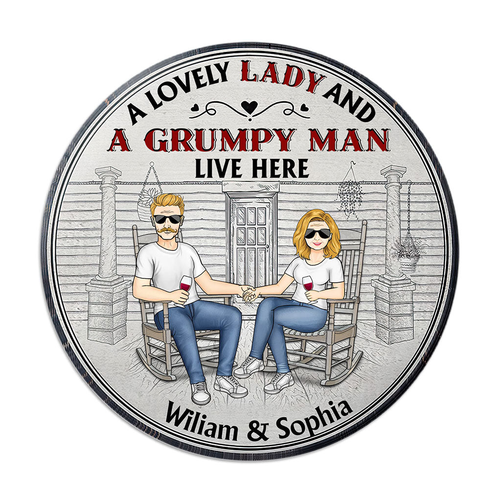 A Lovely Lady And A Grumpy Old Man Live Here - Personalized Couple Round Wood Sign