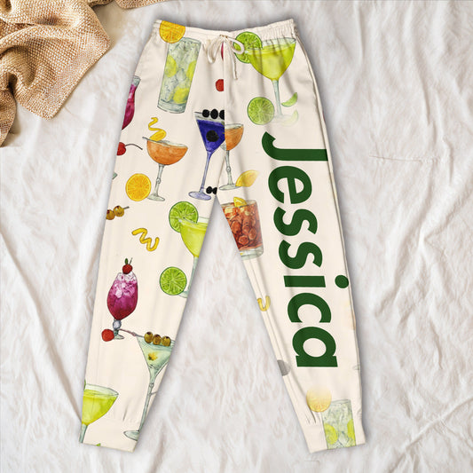 Voller Festtagsstimmung – Bunte Cocktail-Jogginghose mit personalisiertem Design (Unisex)