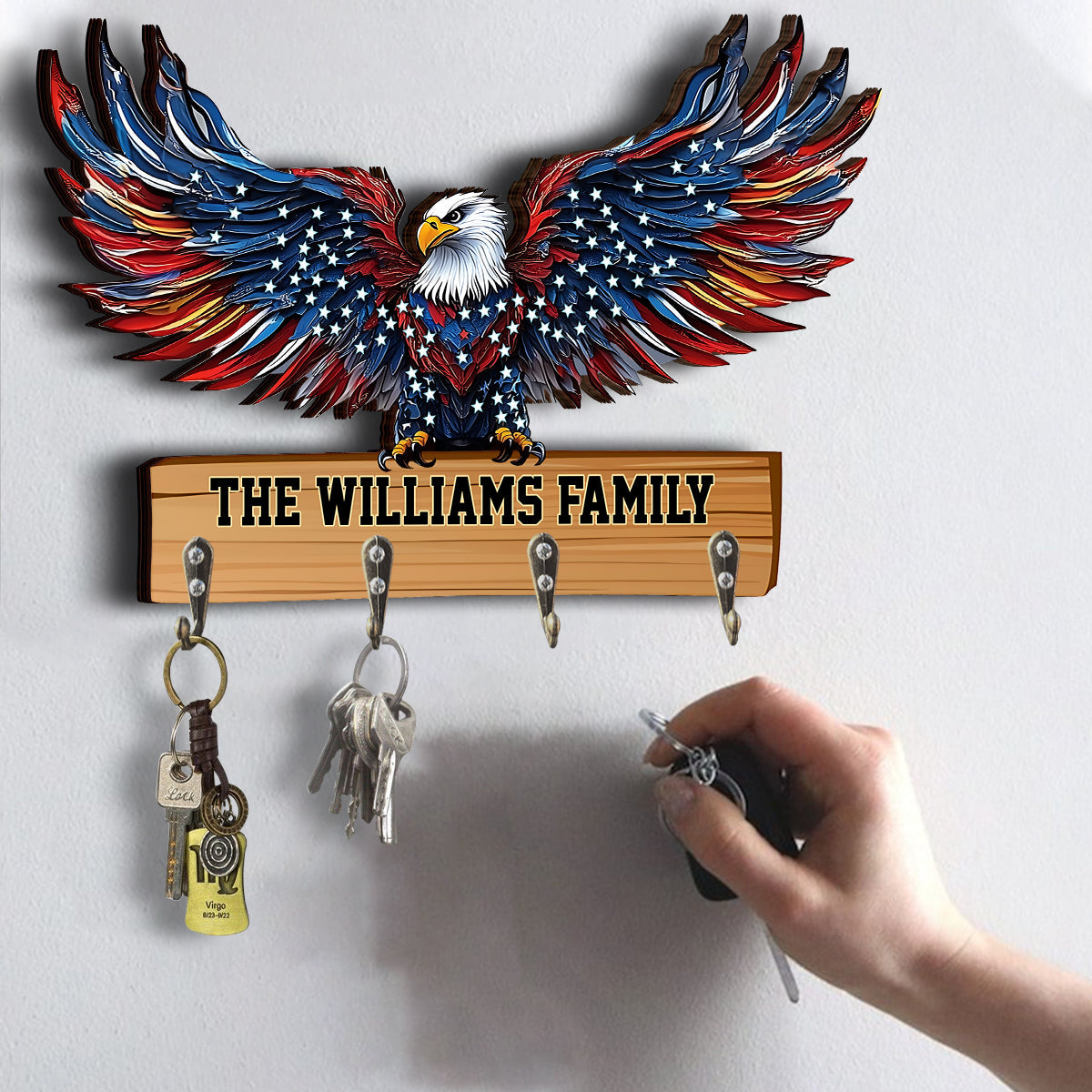Bienvenue dans notre famille ! Porte-clés personnalisé en forme d'aigle à tête blanche.