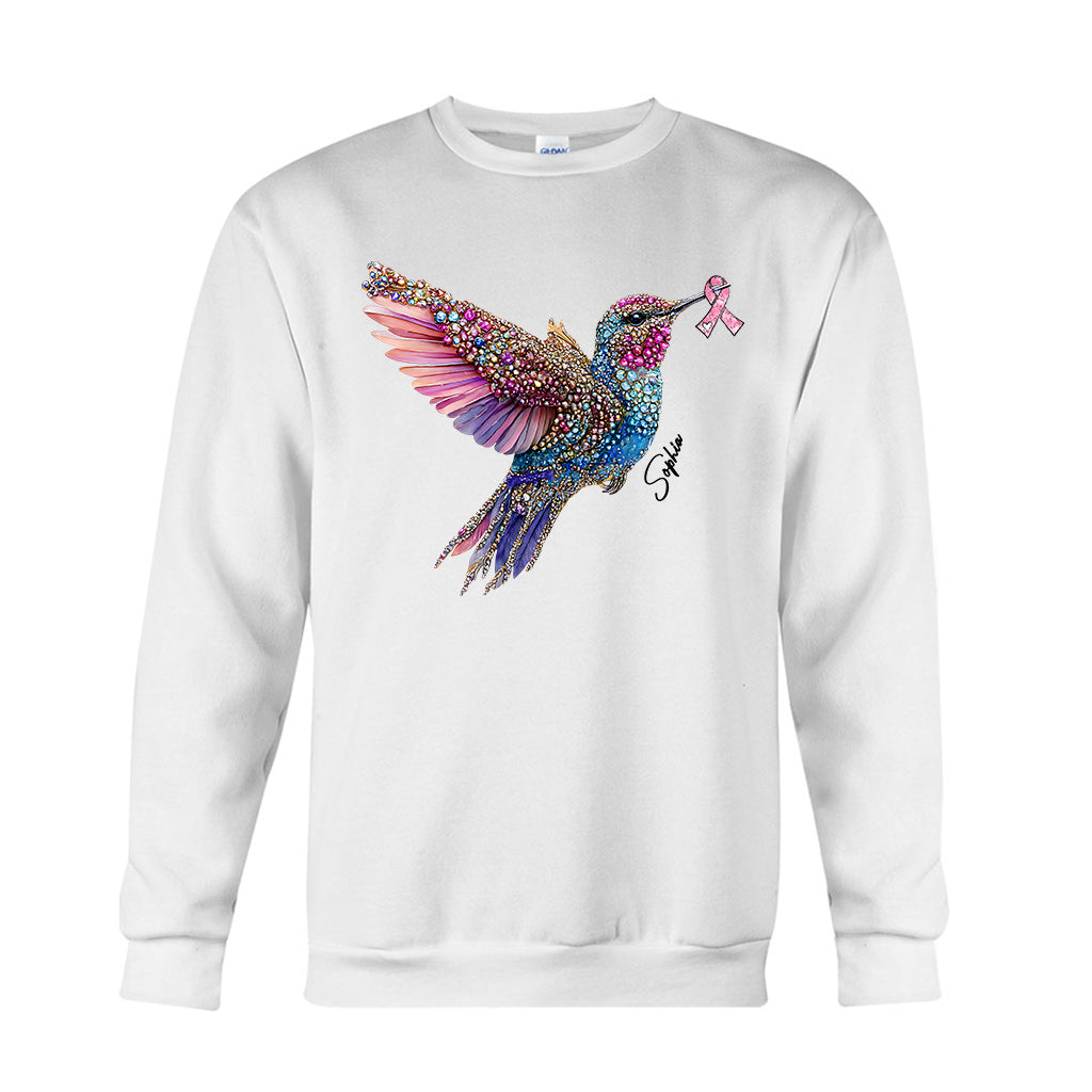 Crystal Hummingbird Pink Ribbon – Personalisiertes T-Shirt und Hoodie zur Sensibilisierung für Brustkrebs