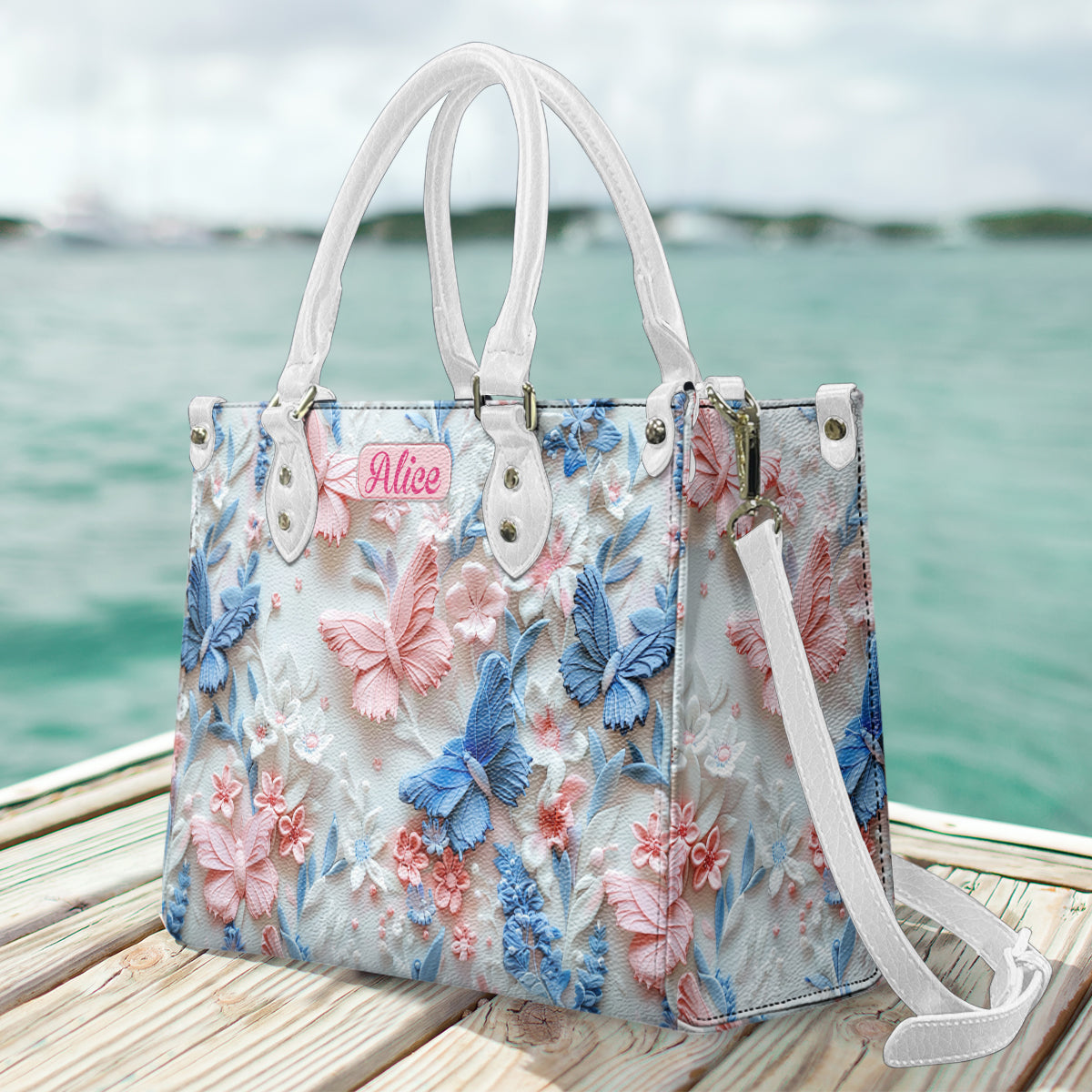 Sac à main en cuir personnalisé avec papillons roses et bleus