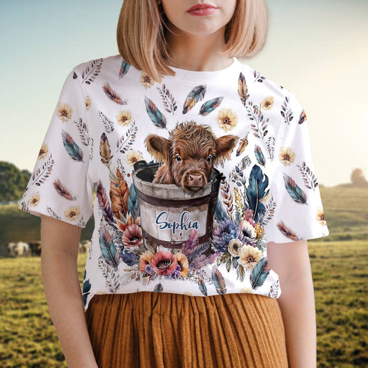 T-shirt personnalisé avec un bébé vache des Highlands dans un seau