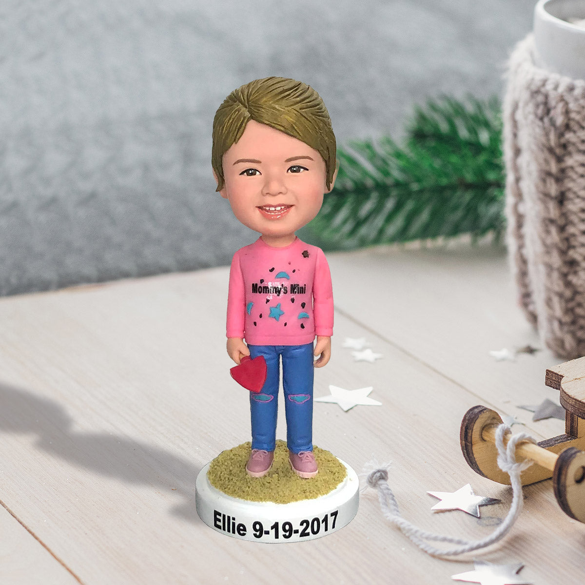 Individuell gestaltete Figur – personalisierte Wackelkopffigur für die Enkelin